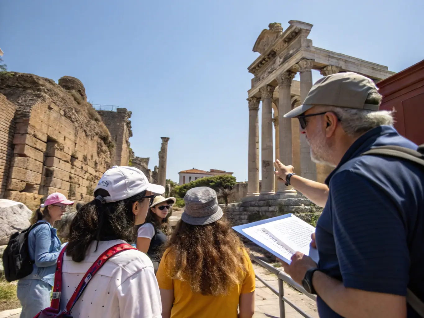 A photograph of a guided tour visiting a local historical site, with a knowledgeable guide explaining the significance of the location to an attentive group of participants.